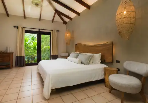 Cala Luna Boutique Hotel Tamarindo Guanacaste Costa Rica - 2 Bedroom Villa shows the master suite with a king bed