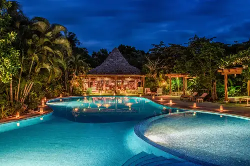 Cala Luna Boutique Hotel Tamarindo Guanacaste Costa Rica, main pool and restaurant at night