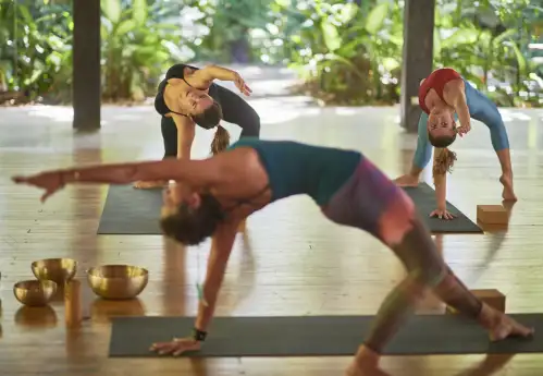 Tamarindo Guanacaste Costa Rica - a small group of women doing yoga at Cala Luna Boutique Hotel