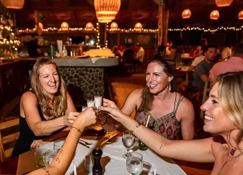 Women enjoying a drink at Dragonfly Bar and Grill in Tamarindo Guanacaste Costa Rica